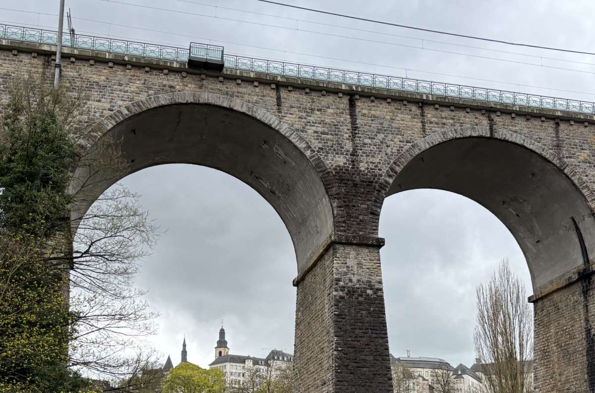 A railway viaduct arching across the valley above the lower city, Luxembourg City, Luxembourg, photo by Next Level of Travel 