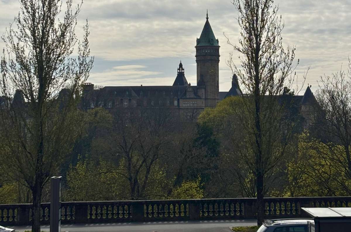 The city skyline with a church spire above the valley, Luxembourg City, Luxembourg, photo by Next Level of Trave