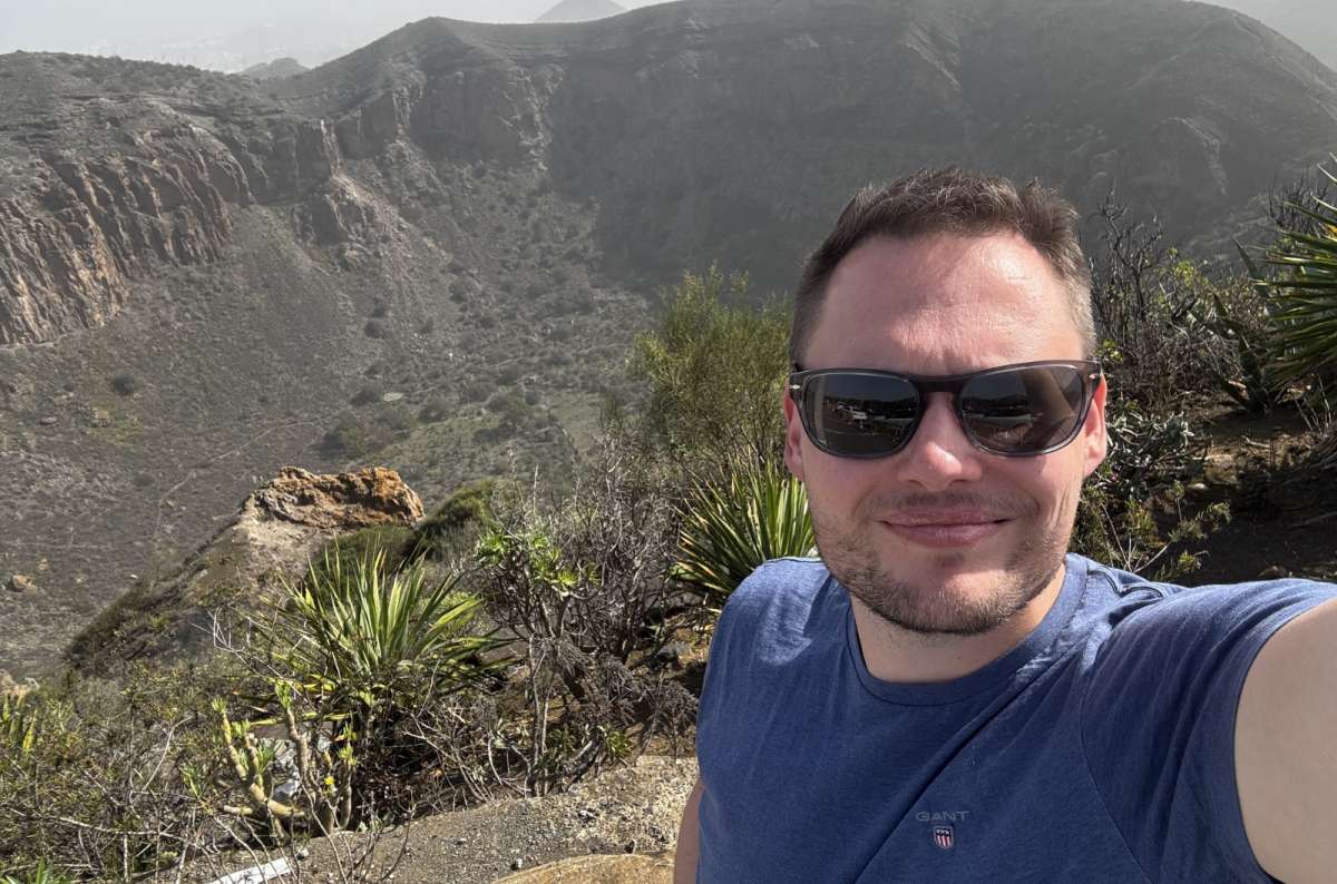 a tourist taking a selfie on the rim of the Caldera de Bandama volcanic crater in Gran Canaria, Canary Islands, photo by Next Level of Travel