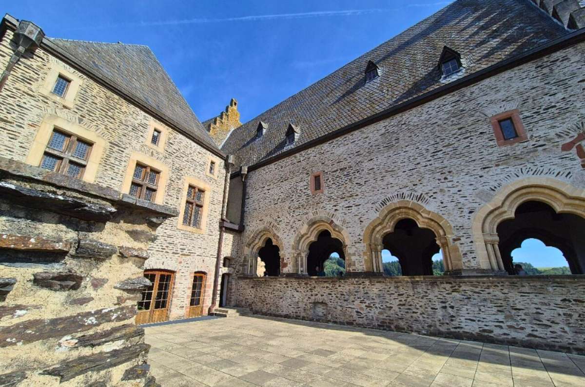 Romanesque cloister and courtyard inside Vianden Castle in Vianden, Luxembourg
