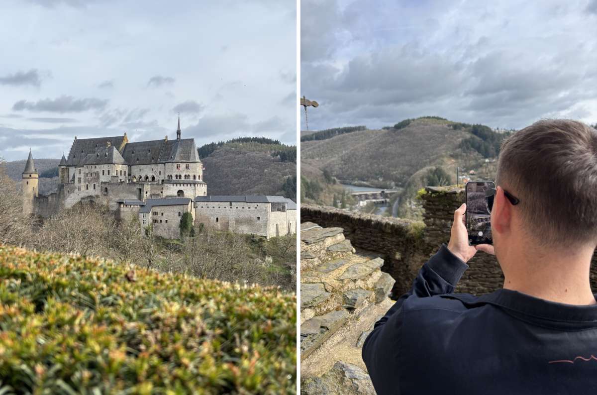 Vianden Castle viewed from a scenic lookout and person photographing the castle from a viewpoint above the town, Luxembourg, photo by Next Level of Travel