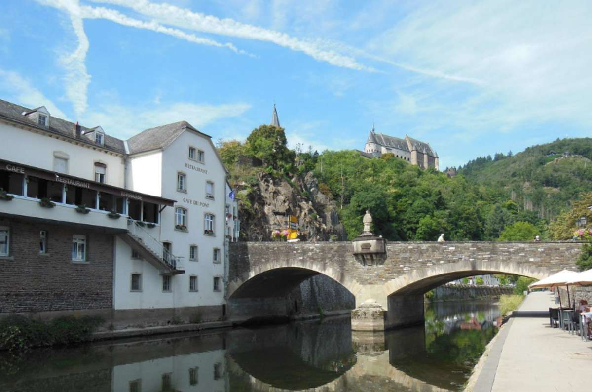 View of Vianden Bridge and Vianden Castle above the Our River in Vianden, Luxembourg
