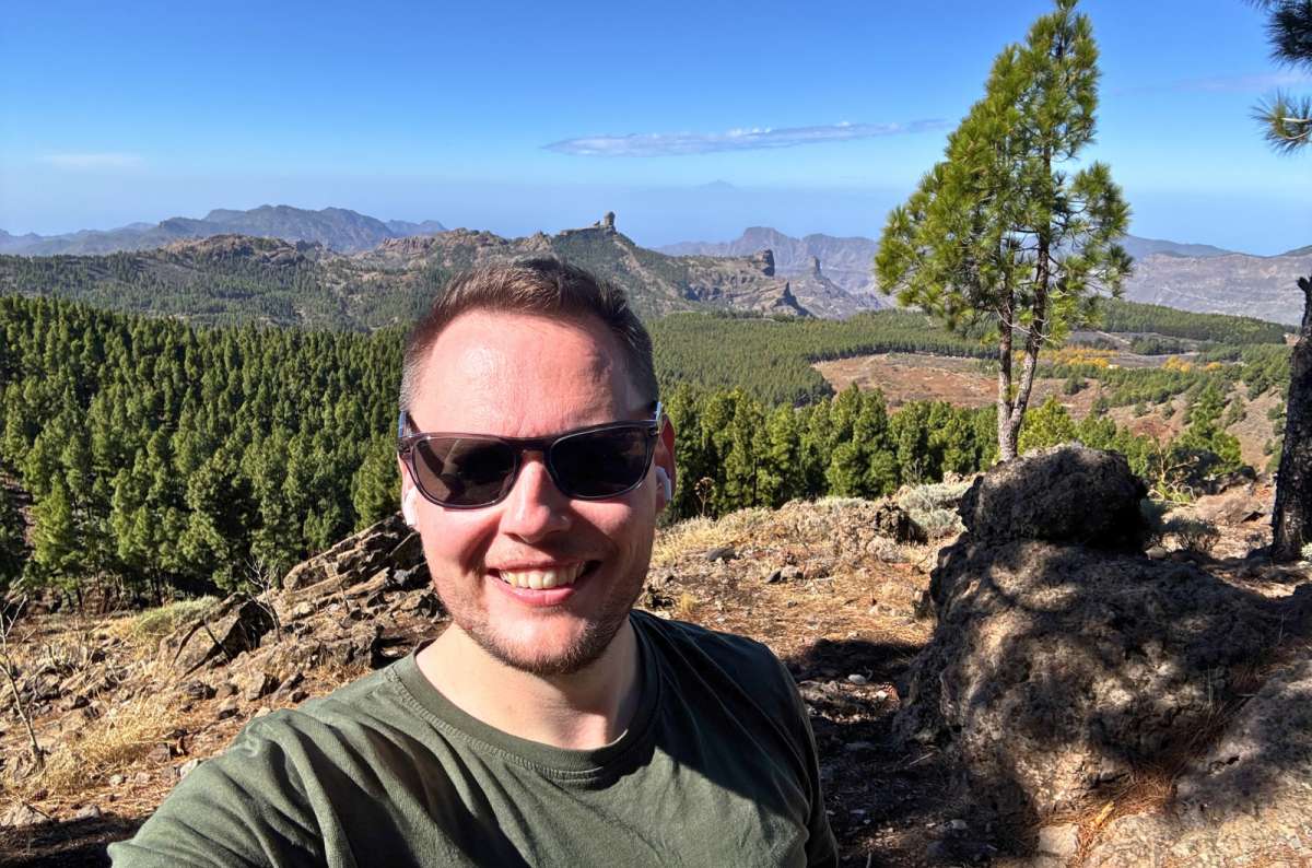 Tourist at Pico de las Nieves viewpoint overlooking Gran Canaria's mountains and pine forests, Gran Canaria, Spain, photo by Next Level of Travel