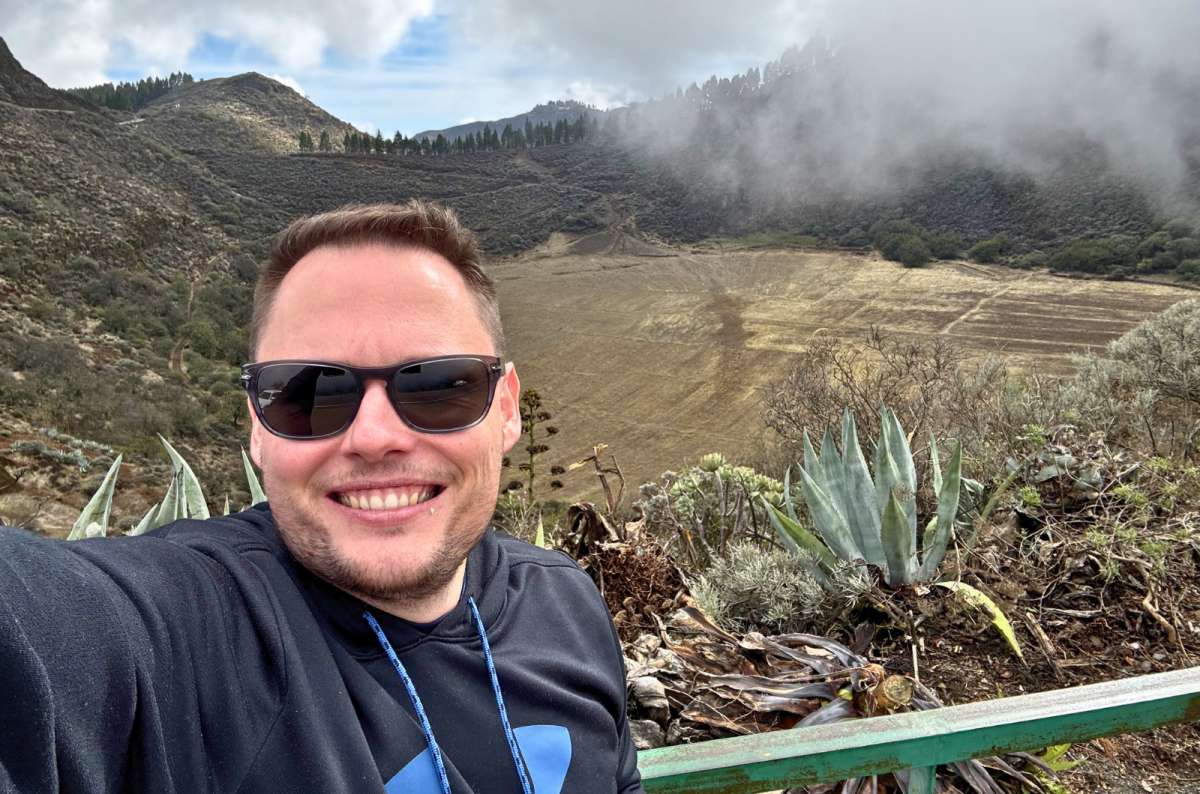 Tourist overlooking the Caldera de los Marteles volcanic crater, Gran Canaria, Spain, photo by Next Level of Travel
