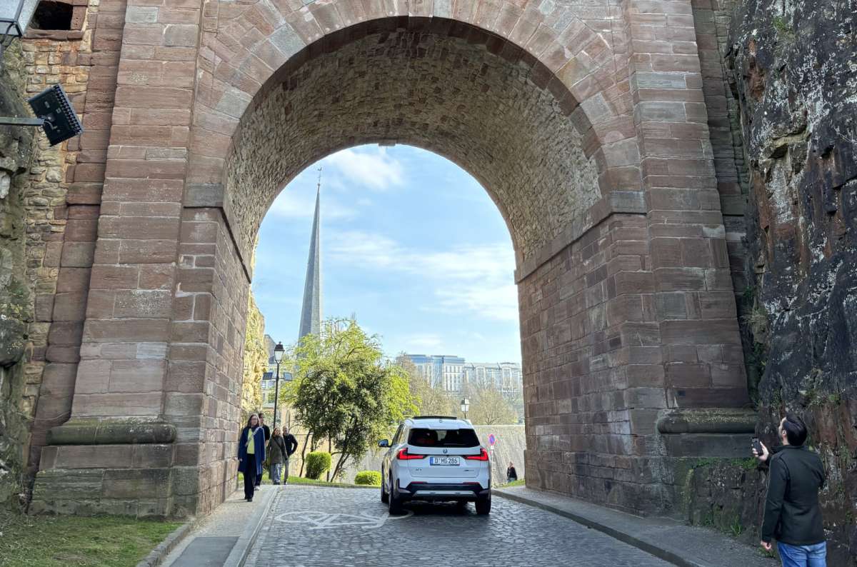 A road passing through an old stone city gate, Luxembourg City, Luxembourg, photo by Next Level of Travel