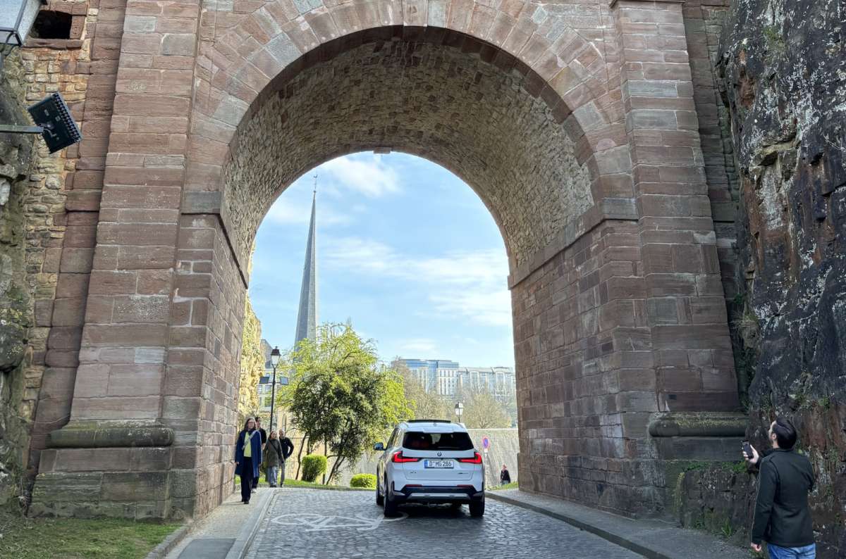 A road passing through an old stone city gate, Luxembourg City, Luxembourg, photo by Next Level of Travel