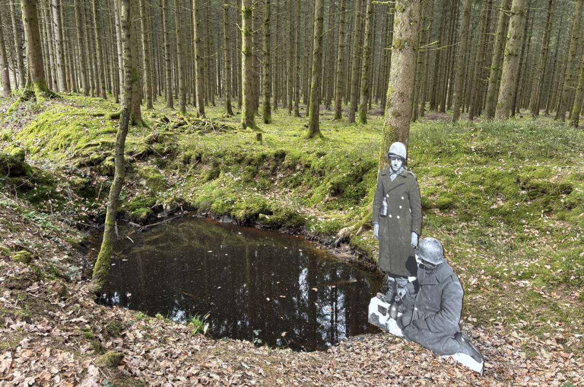 A soldier sculpture reflected in a forest pool on the Schumannseck trail, Schumannseck, Luxembourg, photo by Next Level of Travel