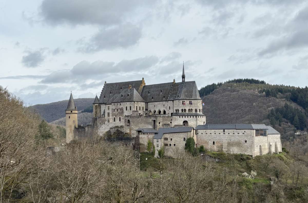 Vianden Castle high on the rock seen from across the valley, Vianden, Luxembourg, photo by Next Level of Travel