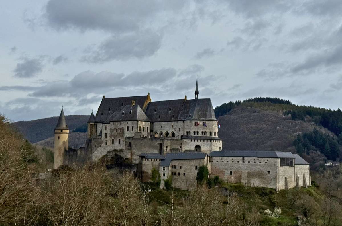 a photo of Vianden Castle on the hilltop above the Our valley, Vianden, photo by Next Level of Travel