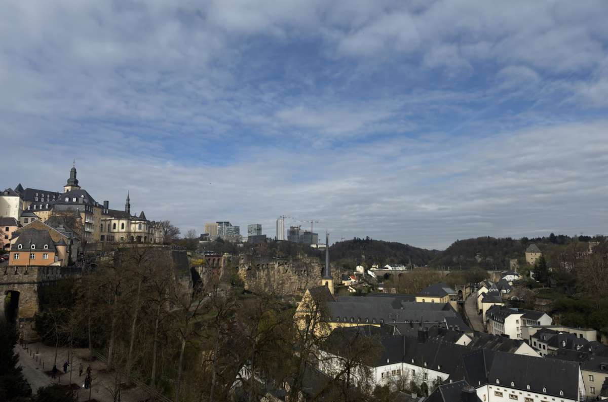a photo of the panorama over the old town and Alzette valley from the Chemin de la Corniche, Luxembourg City, Luxembourg, photo by Next Level of Travel 