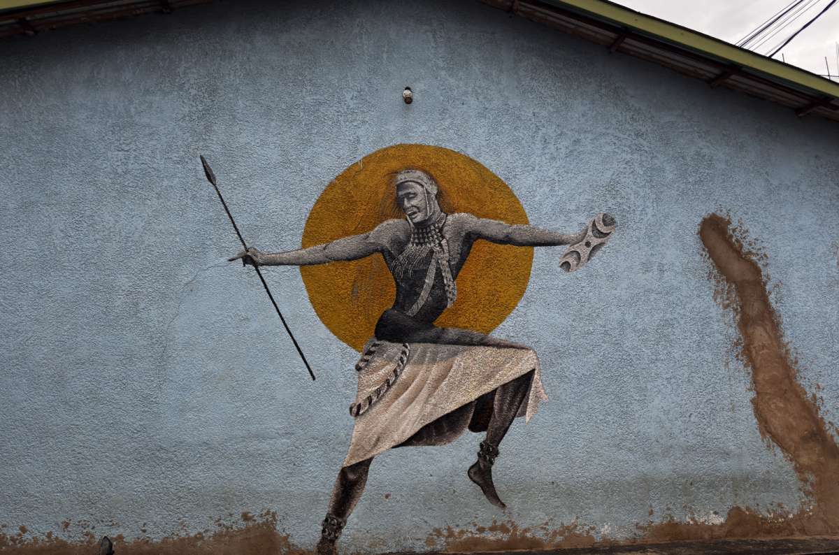 a photo of a colourful street mural on a wall in Kigali, Kigali, Rwanda, photo by Next Level of Travel