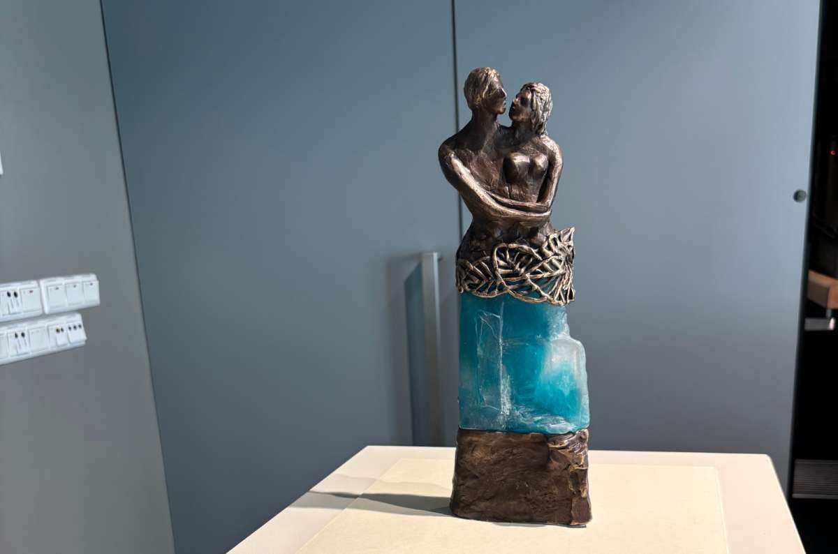 a photo of one of the exhibited pieces in the Pan Tadeusz House, showing a decorative statue of two lovers, Poland, photo by Next Level of Travel
