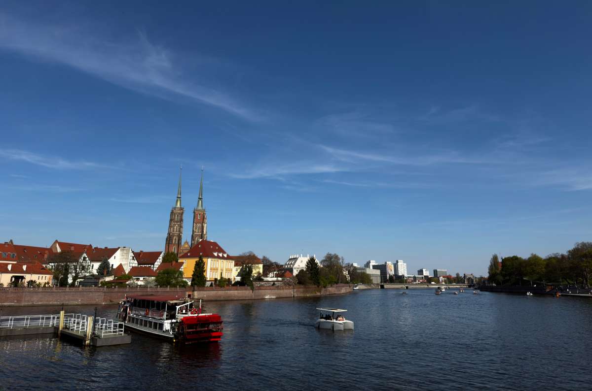 the Cathedral Island from afar with the Oder river taking up the majority of the shot, Wroclaw, Poland, photo by Next Level of Travel