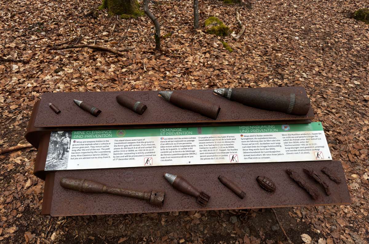 a photo showing a display of WW2 ammunition found along the Schumannseck Trail, Luxembourg, a photo by Next Level of Travel