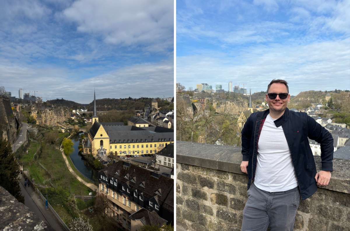 travel photo of Luxembourg City's old town and a visitor on the fortification walls with the Kirchberg skyline behind, photo by Next Level of Travel
