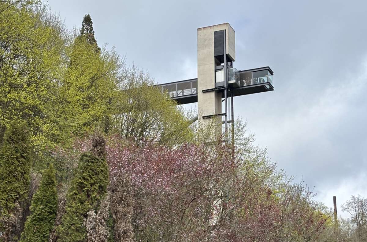 A blossoming spring tree above a valley viewpoint, Luxembourg City, Luxembourg, photo by Next Level of Travel