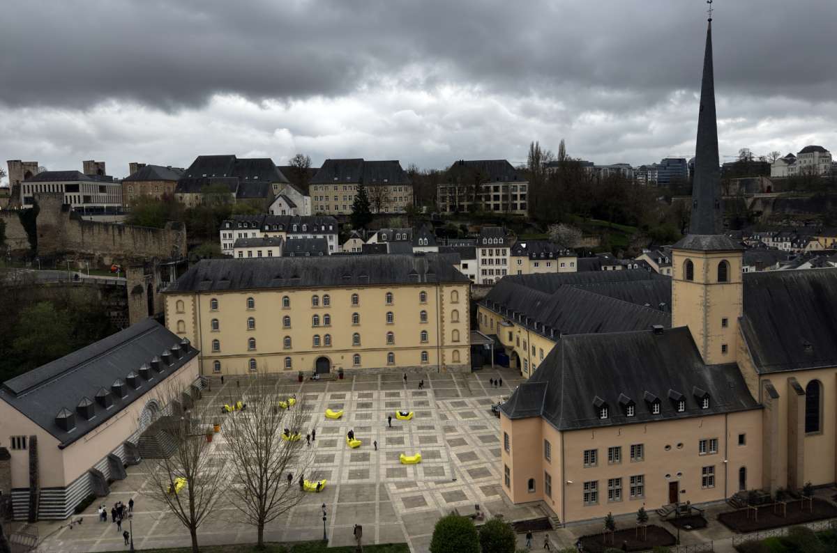 a photo at the Corniche overlooking the Grund quarter and the Alzette valley in Luxembourg City, Luxembourg, photo by Next Level of Travel