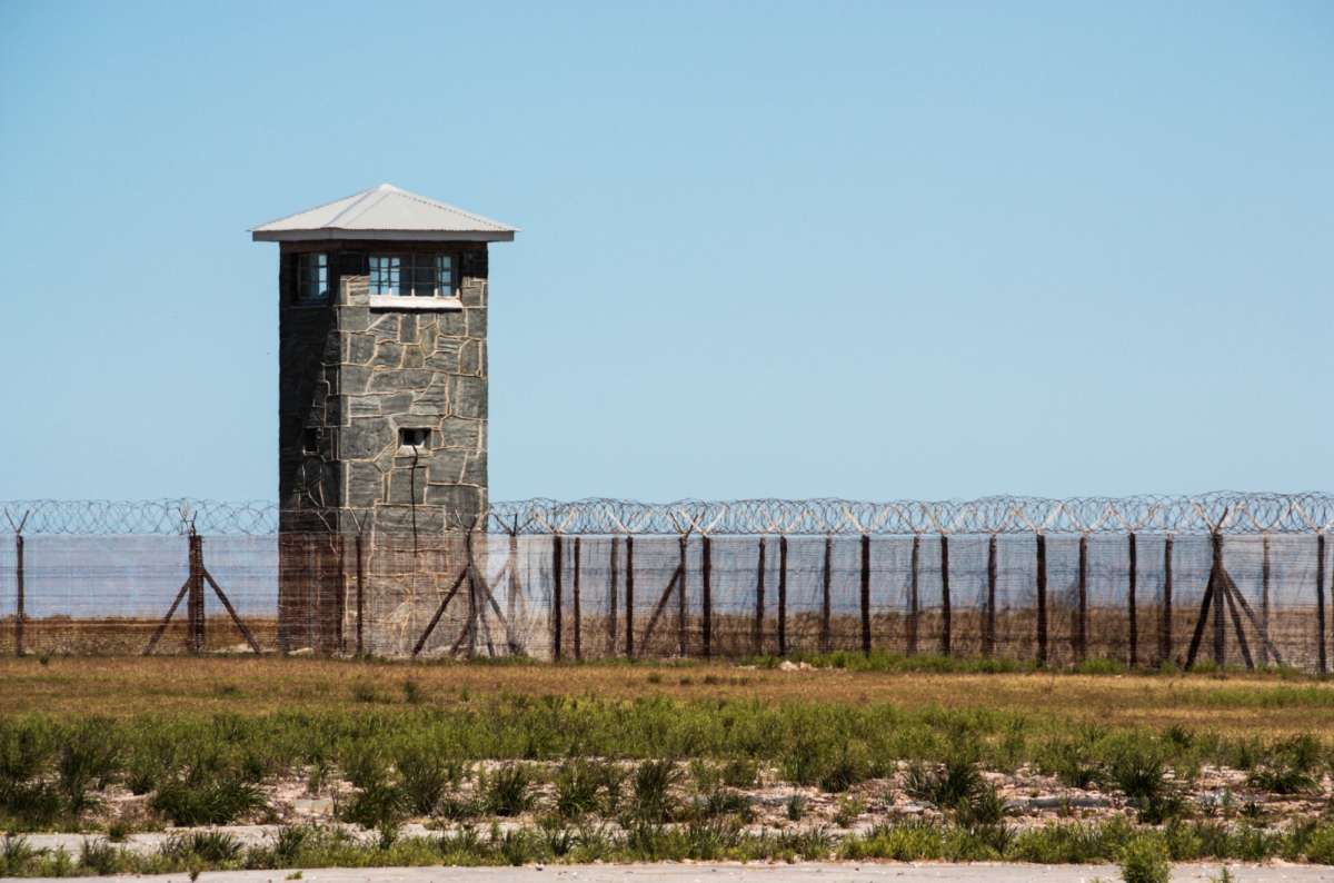 Guard tower and prison fence on Robben Island near Cape Town, South Africa