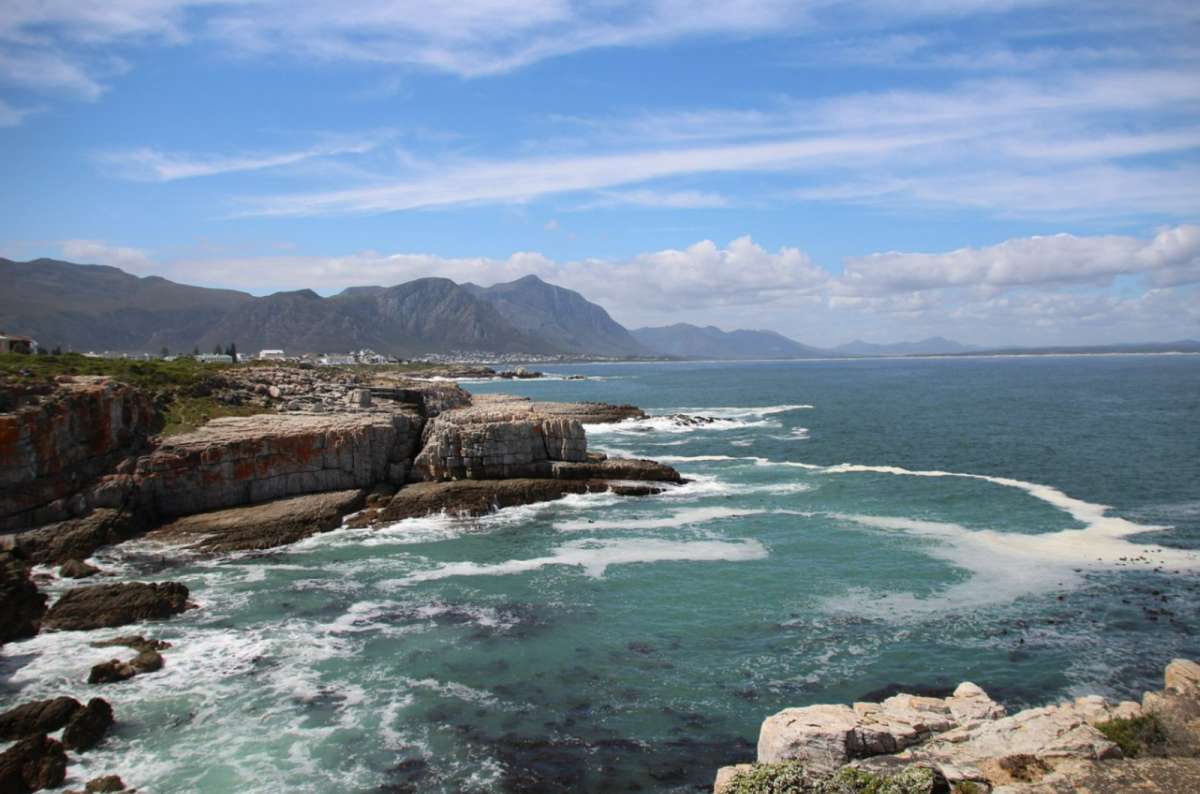 Rocky coastline and ocean views along the Hermanus Cliff Path in Hermanus, South Africa