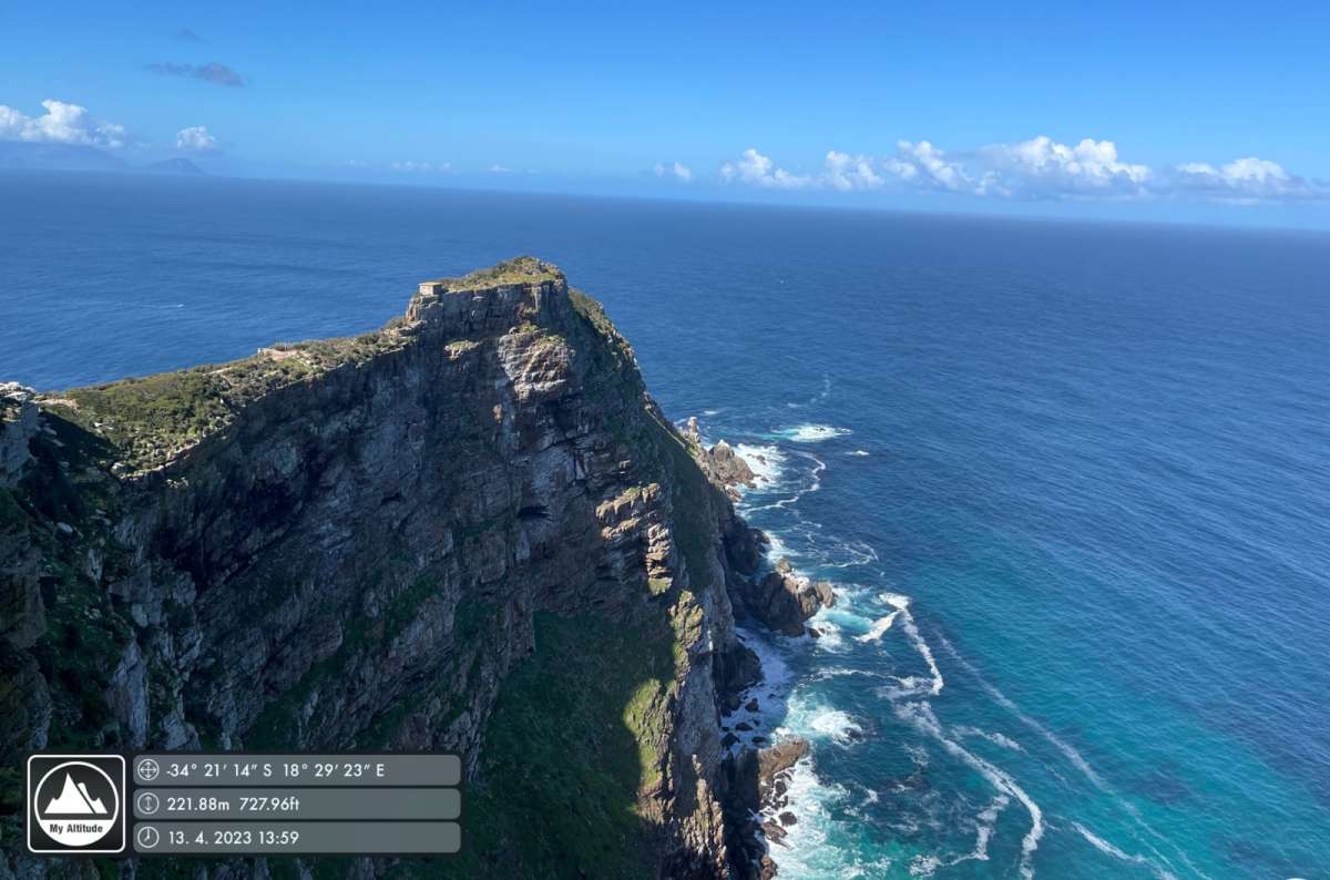 View of Cape Point cliffs and the Atlantic Ocean from the Cape Peninsula Loop, Cape Town, South Africa, photo by Next Level of Travel