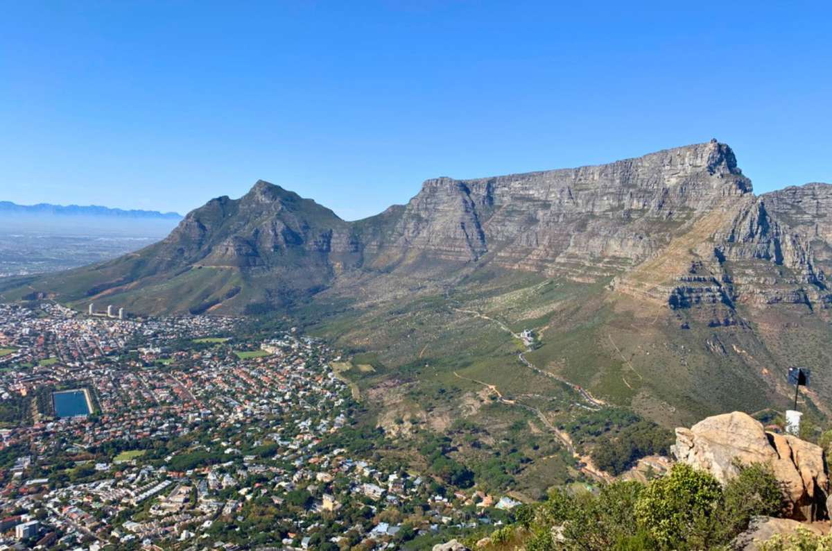 View of Lion's Head and Table Mountain from Signal Hill in Cape Town, South Africa, photo by Next Level of Travel