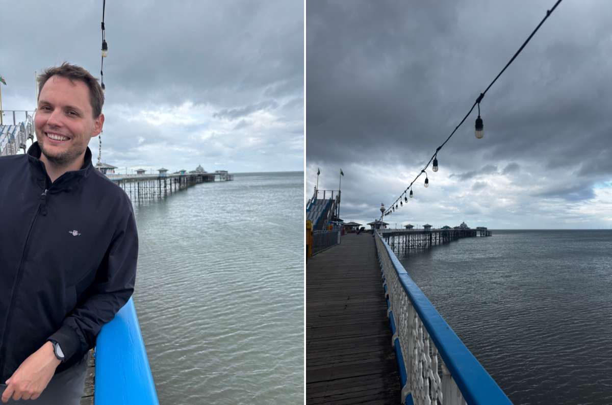 a collage of a tourist leaning on the railings by Llandudno Pier on the left and the pier stretching out under festoon lights on the right, Llandudno, Wales, photo by Next Level of Travel