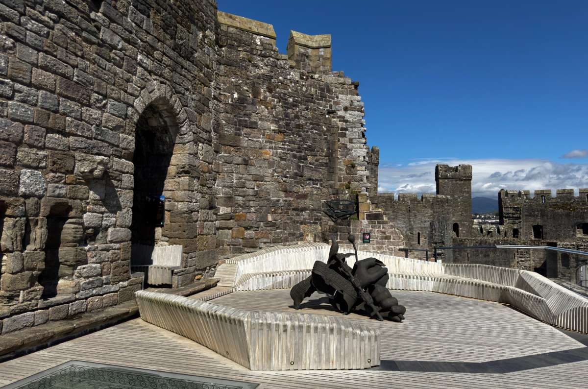 a photo of the rooftop viewing terrace and battlements of Caernarfon Castle under a blue sky, Caernarfon, Wales, photo by Next Level of Travel