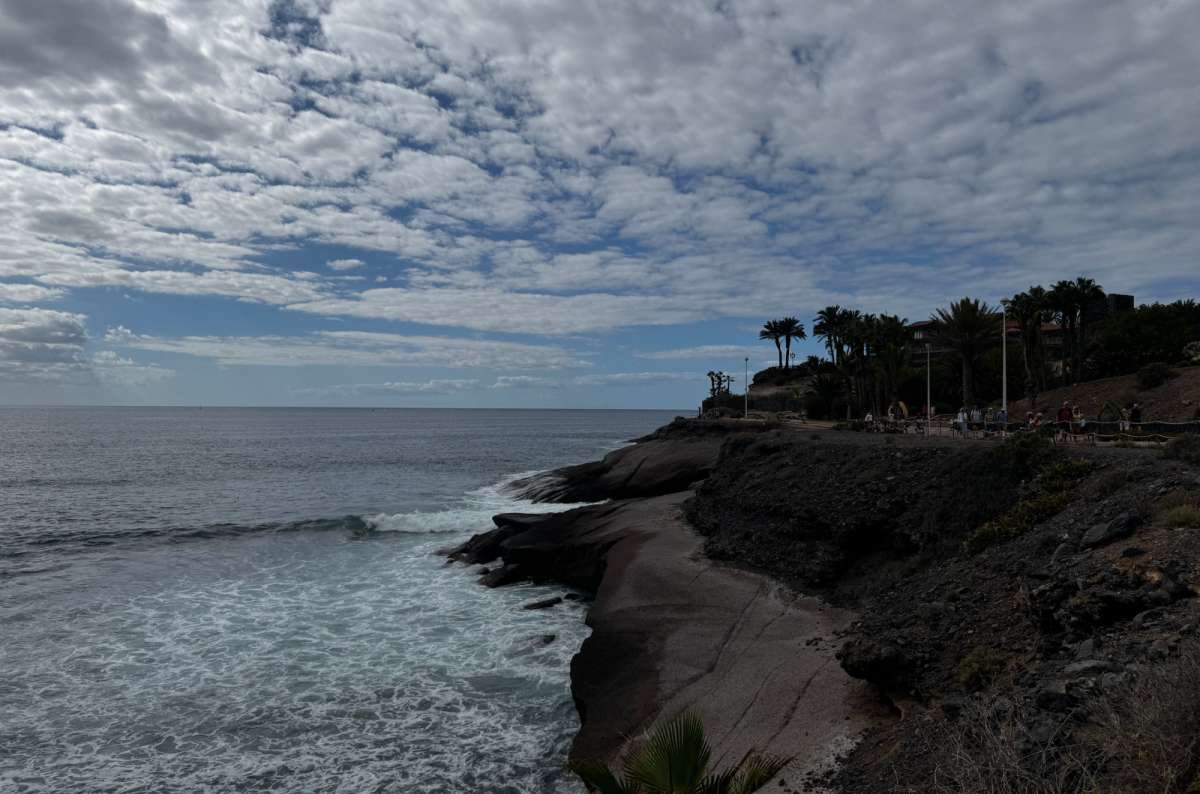 A photo showing Playa del Duque on a cloudy day, Tenerife, a photo by Next Level of Travel