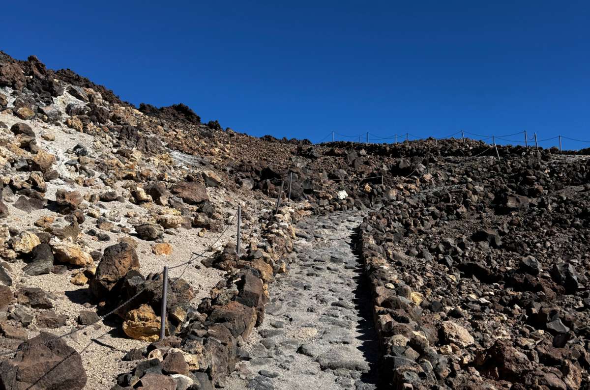 a photo of a roped trail through volcanic rock on Mount Teide, photo by Next Level of Travel