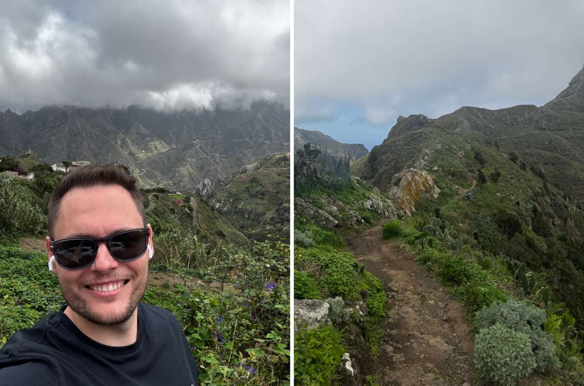 photo of a tourist with mountains in the background on the left and a hiking trail through green terrain on the right, Anaga Rural Park, Tenerife, photo by Next Level of Travel