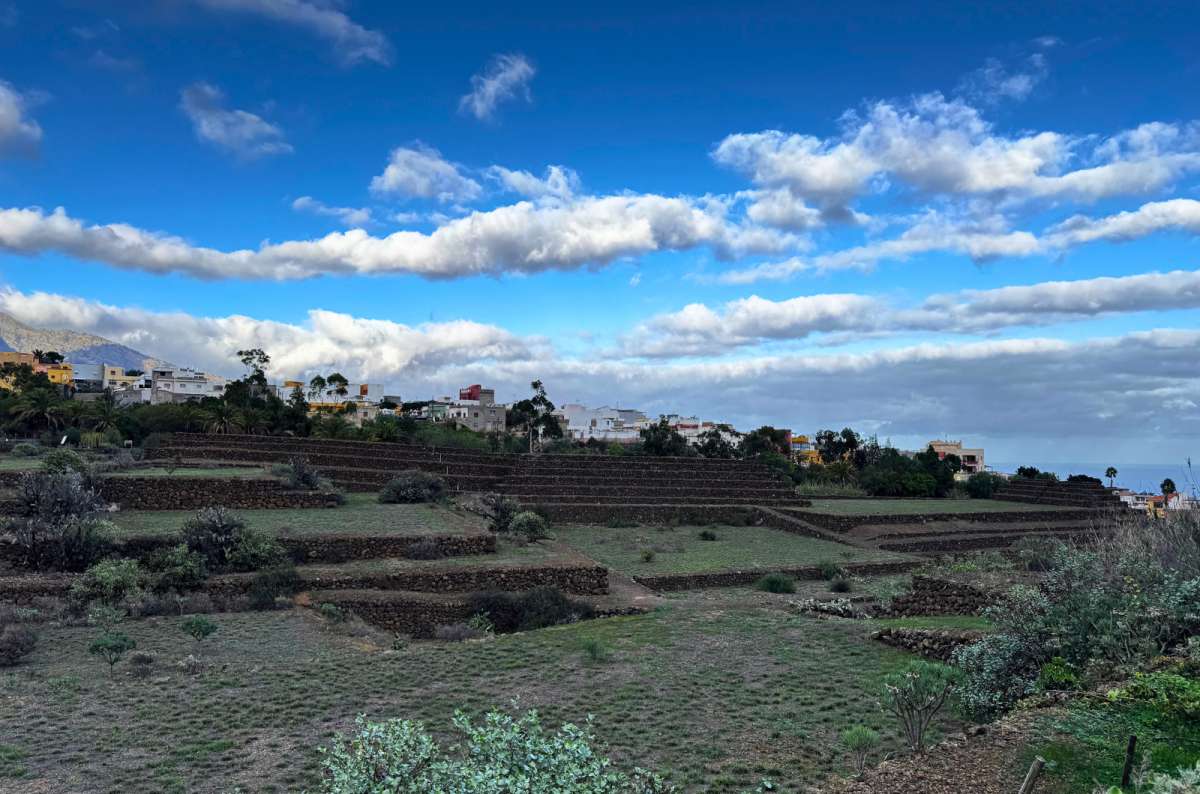 a photo of the stepped stone pyramids with the town of Güímar behind, Tenerife, photo by Next Level of Travel