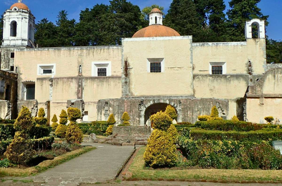 a photo of the facade and gardens of Ex Convento del Desierto de los Leones, Mexico City, Mexico
