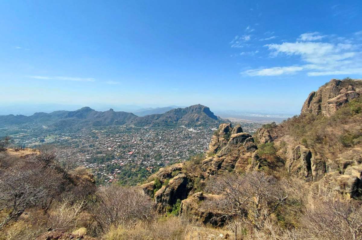 a photo of the view over Tepoztlán and the mountains from the Tepozteco trail, Morelos, Mexico