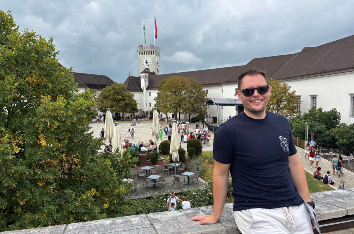 a photo of a tourist in the courtyard of Ljubljana Castle, photo by Next Level of Travel