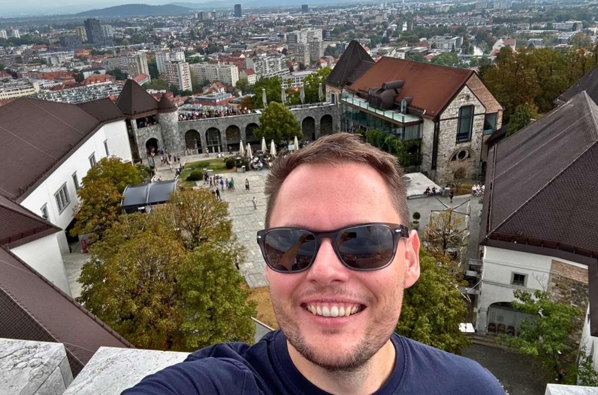 a photo of a tourist taking a selfie on the Outlook Tower of Ljubljana Castle, Slovenia, photo by Next Level of Travel