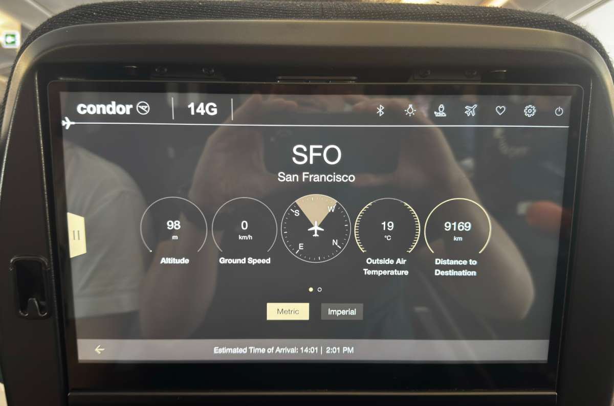 a photo of the Condor Premium Economy seatback screen showing flight information to San Francisco, photo by Next Level of Travel