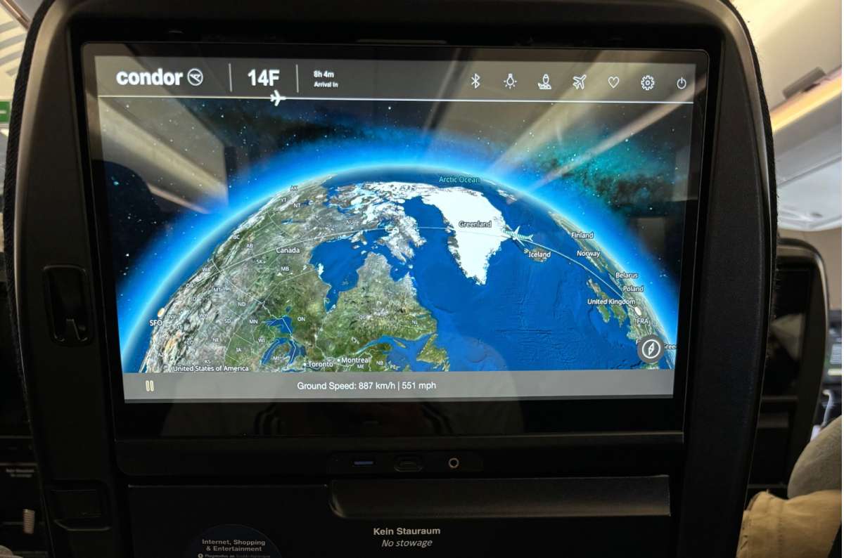 a photo of the Condor seatback moving map showing the flight over the North Atlantic between Greenland and Iceland, photo by Next Level of Travel