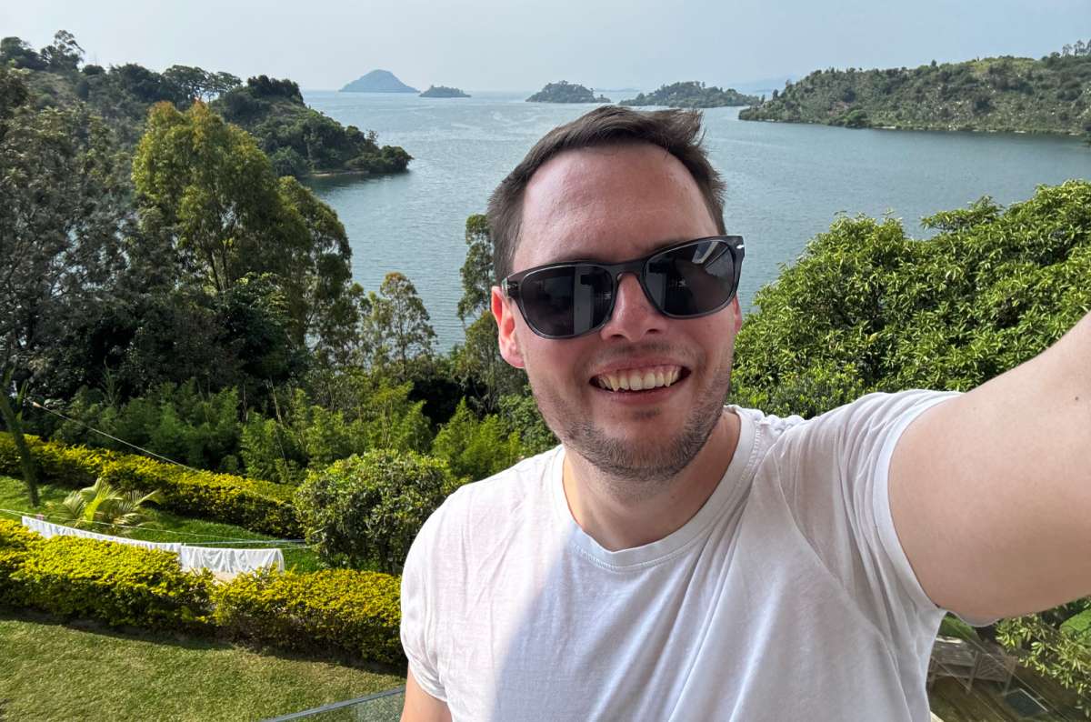 a photo of a tourist overlooking Lake Kivu, Karongi, Rwanda, a photo by Next Level of Travel