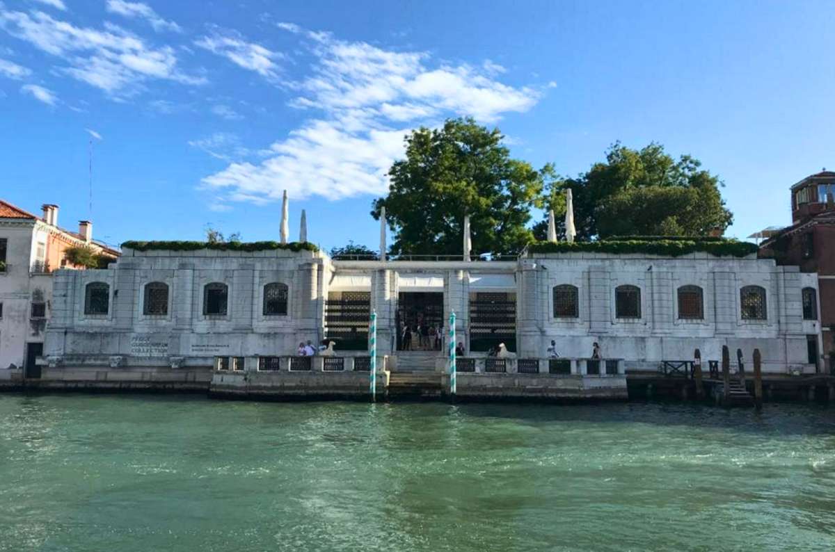 a photo of Palazzo Venier dei Leoni, home of the Peggy Guggenheim Collection, seen from the Grand Canal, Venice, Italy, photo by Next Level of Travel