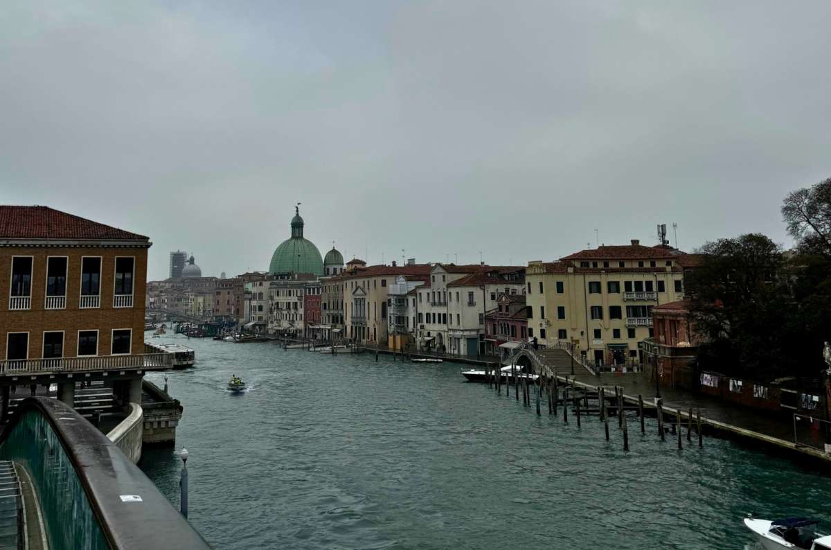 photo of the Grand Canal and the green dome of San Simeone Piccolo seen from Ponte della Costituzione near Piazzale Roma, Venice, Italy, photo by Next Level of Travel