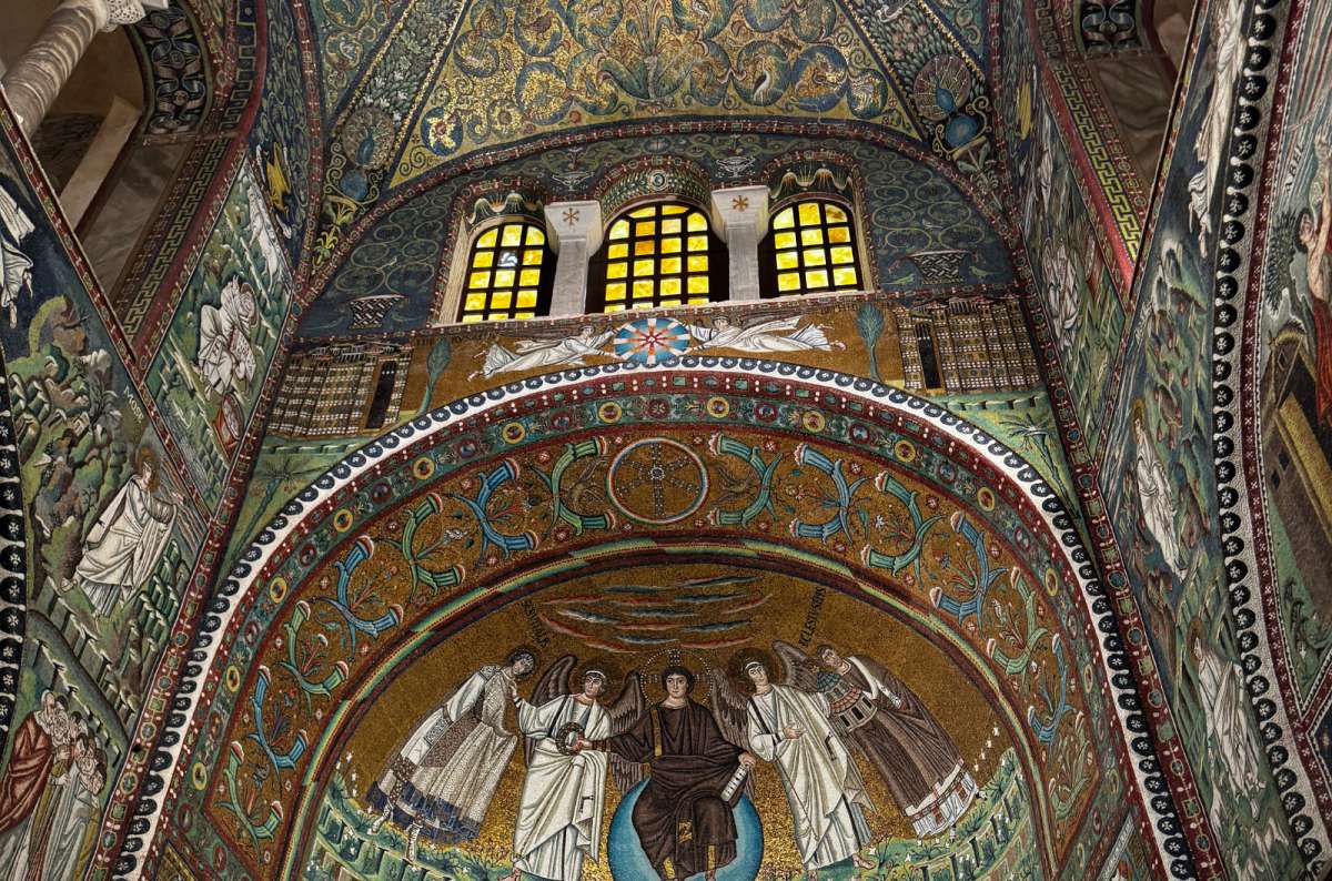a photo of the shimmering Byzantine mosaics in the apse of the Basilica of San Vitale, Ravenna, Italy, photo by Next Level of Travel