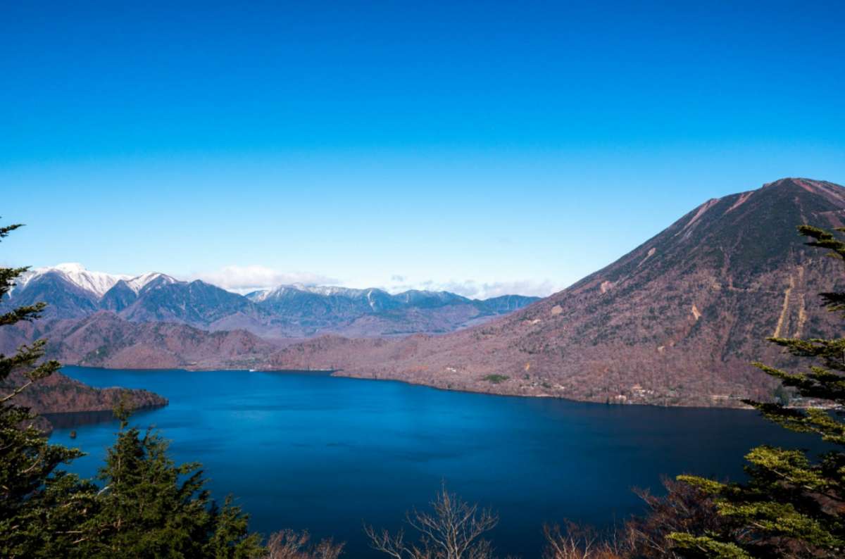 a photo of Lake Chūzenji and Mount Nantai from the Hangetsuyama observation deck, Nikko, Japan