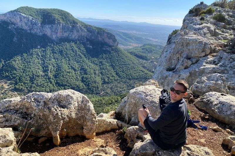 A tourist in Tramuntana Mountains in Alcudia, Spain