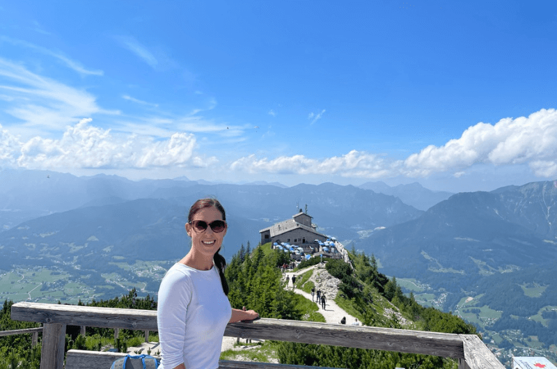 Standing at a viewpoint over the Eagle’s Nest with the mountains in the background 