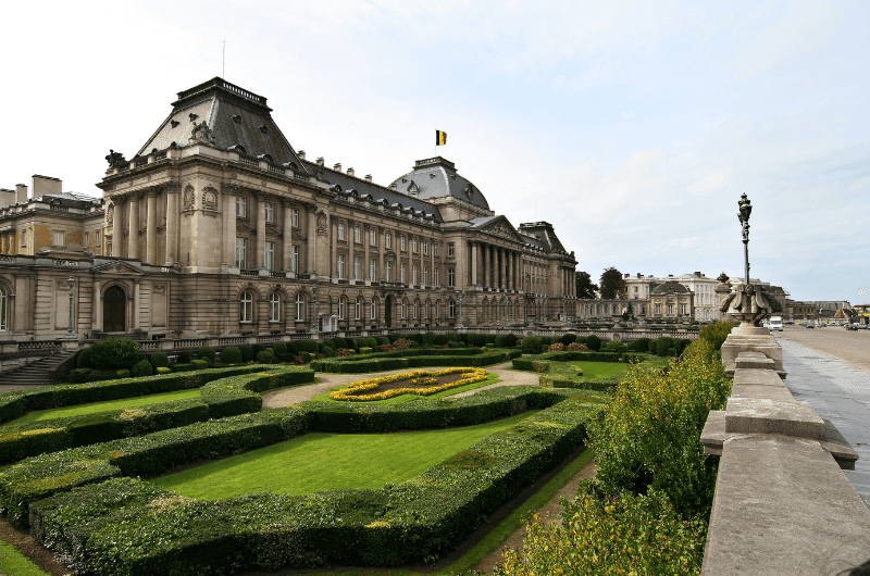 Royal Palace of Brussels with manicured garden in front 