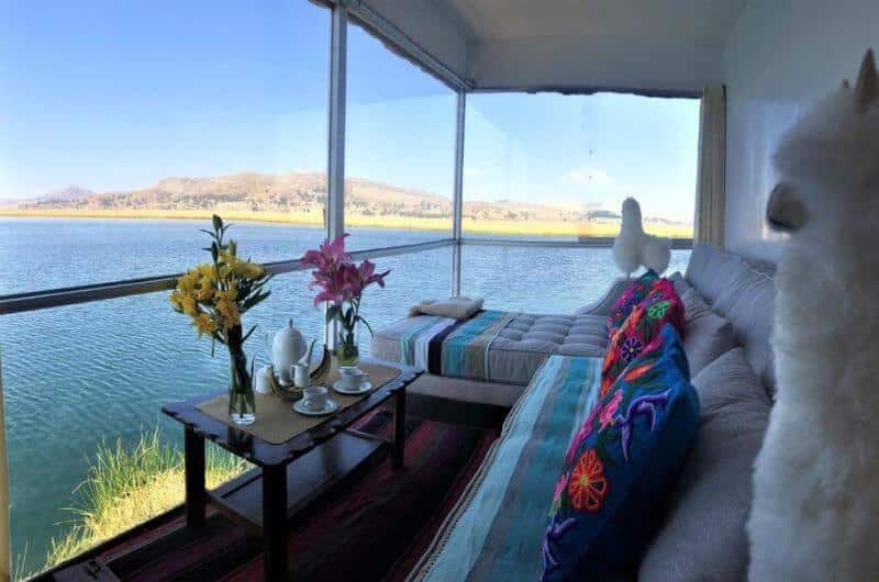 A hotel room at the Qhapaq Lago Titicaca with views out to the lake 