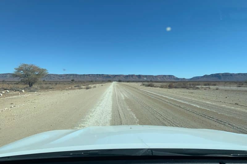 Driving through the empty Namibian roady